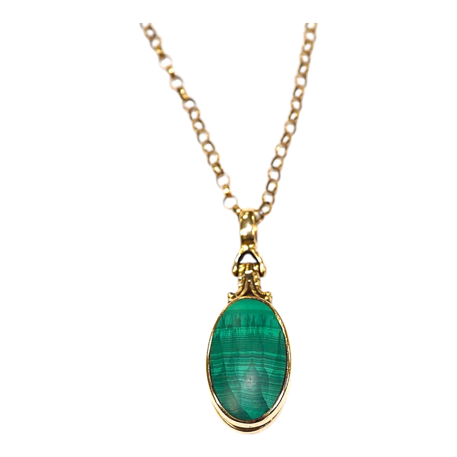 A modern yellow metal mounted malachite and mother of pearl set pendant, overall 43mm, on a 9ct gold chain, 60cm, gross weight 15.4 grams. Condition - fair